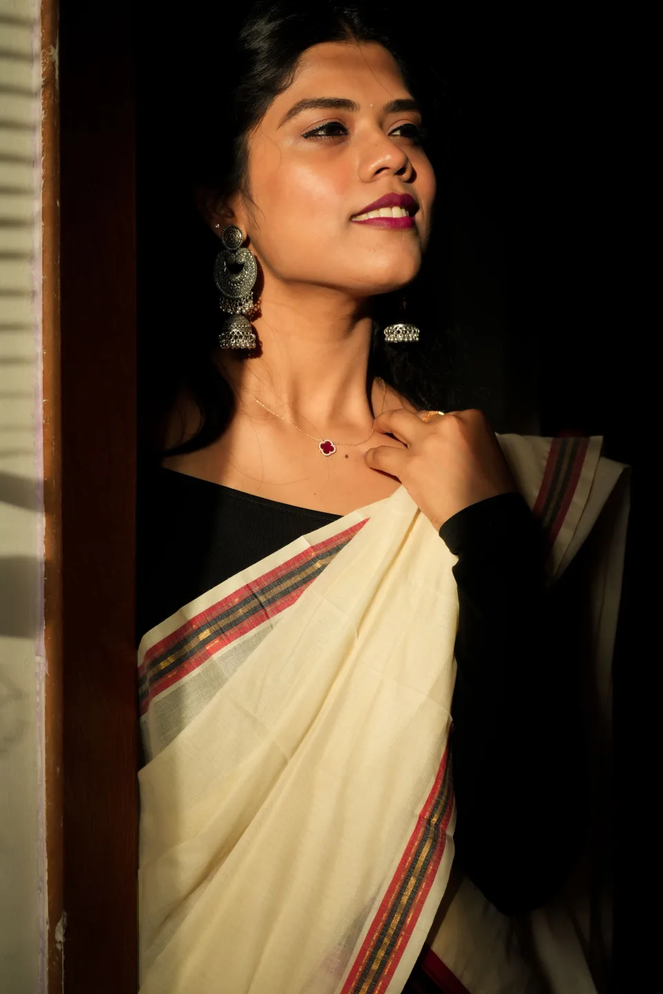 Noor jhumkas, a black slip dress and the last table on the terrace.